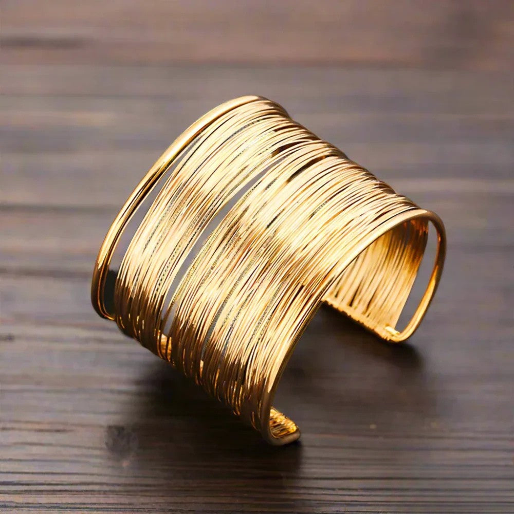 Ouda™ polsino d'oro